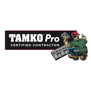 TAMKO Pro Certified Contractor logo featuring a cartoon worker holding roofing materials and tools, showcasing expertise in solar roofing Florida, positioned next to the text.